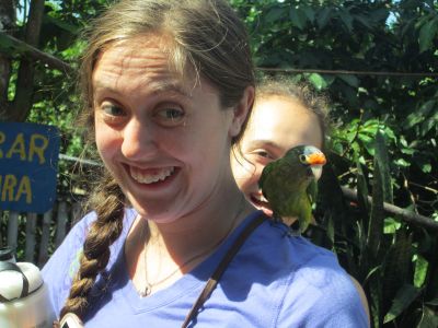 Emily and Molly (and several others) make a new friend on the Vicente Padilla coffee farm.