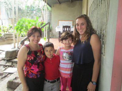 Maddie with members of her service host family.