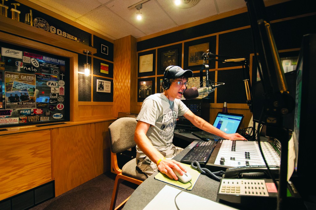 Student working at the The Globe radio station