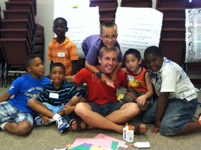 Quinn with children while on Mission Inquiry