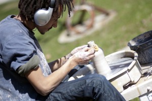 Ceramic student on potter's wheel