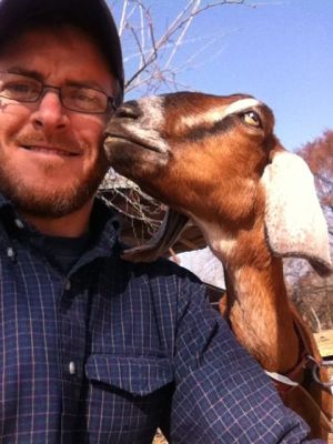 Jon with Goat while WWOOFing