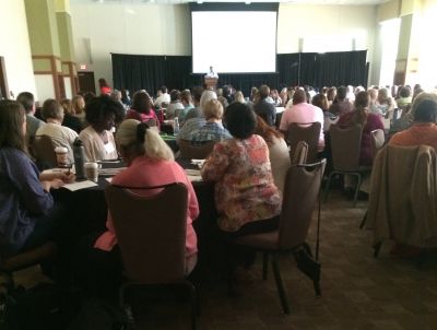 Local food fans consider food policy. local food gathering