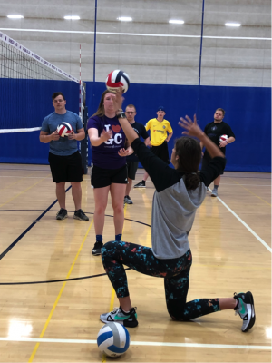 Students practicing volleyball in the Rec-Fitness Center