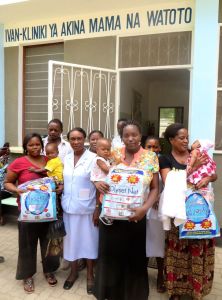 Mothers at the clinic receiving their nets