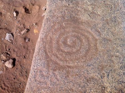 An ancient pattern carved into a stone at Caral.