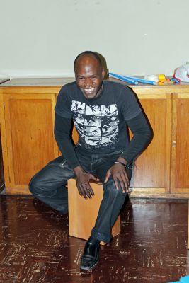 Camilo Ballumbrosio demonstrates how to play the cajon.