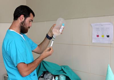 Rudy at work in the clinic's emergency room.