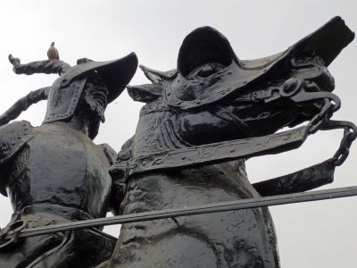 A close-up view of the conquistador statue.