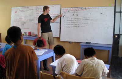 Dean in the classroom where he teaches English. This day class was not in session, but some of the children were there doing homework.