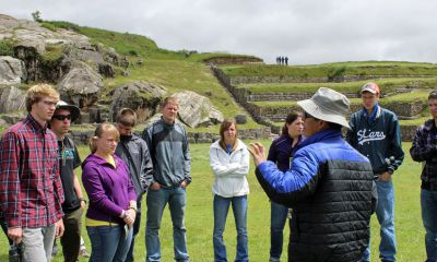 Students listen to Abrahan Quispe Corrales, our Cusco guide.