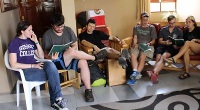 April, Jonathan, Neal, Thomas, Jackson, Gretchen and other students sing hymns at Casa Goshen.