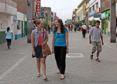 April and Malaina stroll down Calle Lopez de Zuñiga, a pedestrian-only street in Chancay.