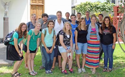Students pause for a photo in the sunny courtyard of Victor's Delfin's home and studio.