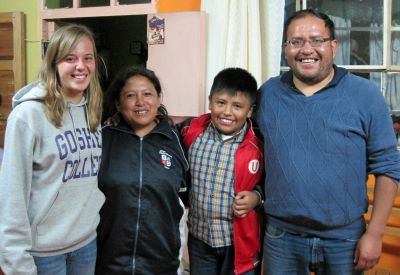 Gina with her host parents, Juan Baldoseda and Carmen Banon, and one of her host brothers.