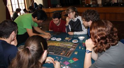 Andres Francisco Paredes Salgado teaches students how to play his game.