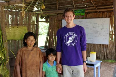 Derek with his host  mother and brother. His host father was out  hunting the day we visited San Miguel.