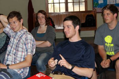 Students ask Andrés Francisco Paredes Salgado how he developed his board game.