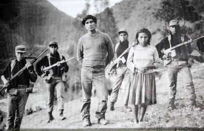 In Lar Mar, Ayacucho, in June 1985, soldiers stand with Ramon Laura Yauly and his wife, Concepcion Lahuana. They told soldiers that they were forced to join the Shining Path.