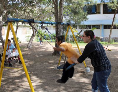 Miranda brings some joy to a child.