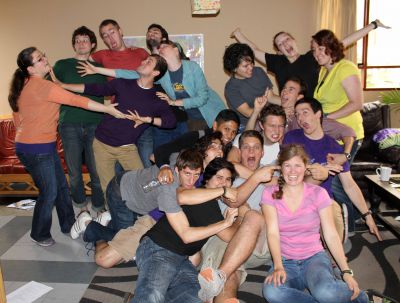 Students break into silly poses and bizarre facial expressions before leaving for their service assignments.