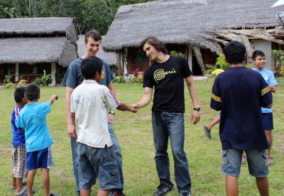 Lucas and Joel speak with some boys.