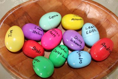 Easter eggs held slips of papers with the service assignments of the students and some candy.