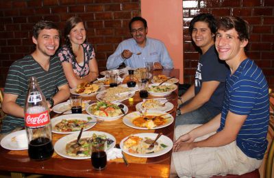 Peru SST Co-Director Richard R. Aguirre eating dinner with Stefan, Emma, Derek and Tim in San Ramon.