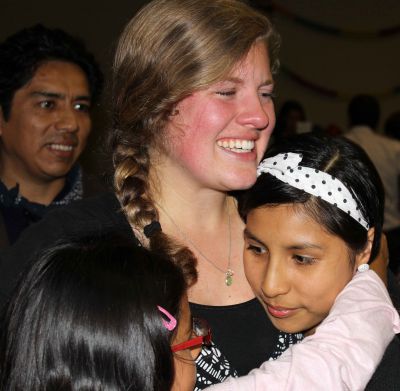 Emma tearfully embraces her host sisters, Lucia and Eva.