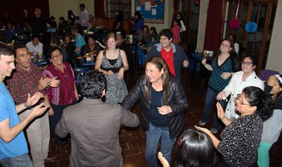 Students and host family members enjoy a final dance at the despedida (farewell party).