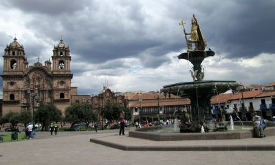 Cusco's Plaza Mayor, or central plaza, and la catedral del Cusco, with storm clouds rolling in. The rainy season is beginning!
