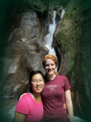 Shina and Laura pose in front of a waterfall near their home in San Ramon.