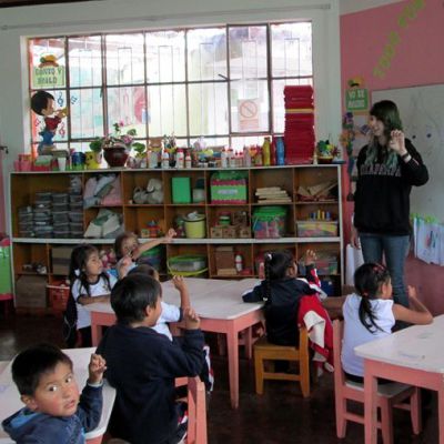 Lydia teaches Peruvian Sign Language to young students in her classroom in Oxapampa.
