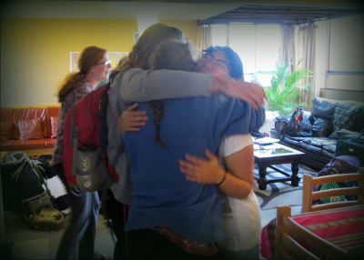 Mariah and Elizabeth receive a big hug from Shina after arriving on the bus from Ayacucho.