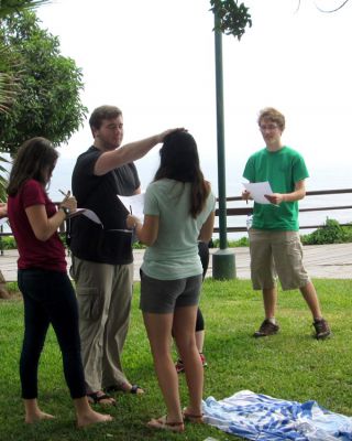 Ammon offers Maria a blessing during one of our get-acquainted games.