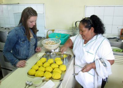 The potato mixture is divided into balls, which will be divided in two and pressed into individual serving molds, along with a filling.