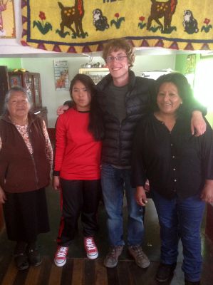 Christian with his host grandmother, sister and mother.