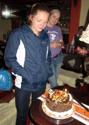 Courtney makes a wish before blowing out a candle to start a new decade of life.