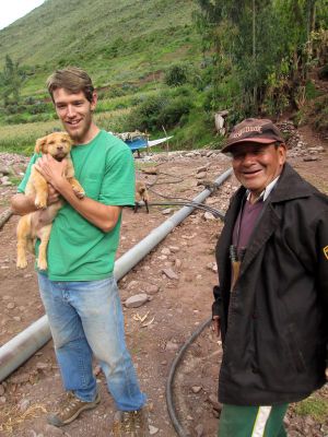 Micah with a family puppy, "Gringo."