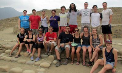 A group photo in front of Caral's main pyramid.