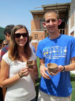 Michael (wearing his what's-the-weather-forecast-in-Kansas T-shirt) and Morgan as potters at a workshop in Lima. 