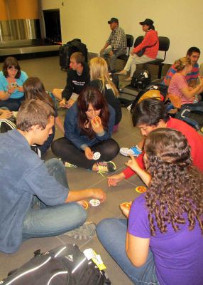 Finding an excuse for card game at Jorge Chavez International Airport.