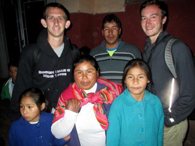 Michael, left, and David with their host family in Lucre.