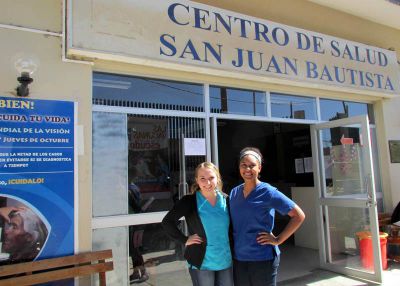 Kate and Asia in front the Centro de Salud in Ayacucho.