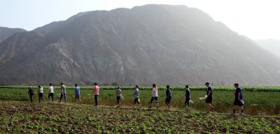 The level fields in the valley are irrigated from a river flowing down from the Andes or from wells.