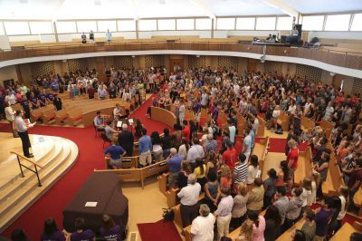 Students and staff sing the Alma Mater during the opening convocation. 