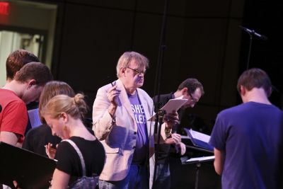 Garrison Keillor gives notes during a rehearsal with the Goshen College Chamber Choir.