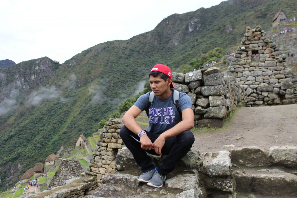 Alejandro Genis observes ancient ruins during his SST experience in Peru