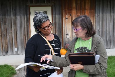 Izaete Nafziger (left), a pastor at North Goshen Mennonite Church, talks with Jan Rheinheimer (right), a pastor at Lombard Mennonite Church, Chicago, during the Pastors Academy at Merry Lea on Sept. 21. (Photo by Richard Aguirre)