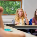 Student signing in a class